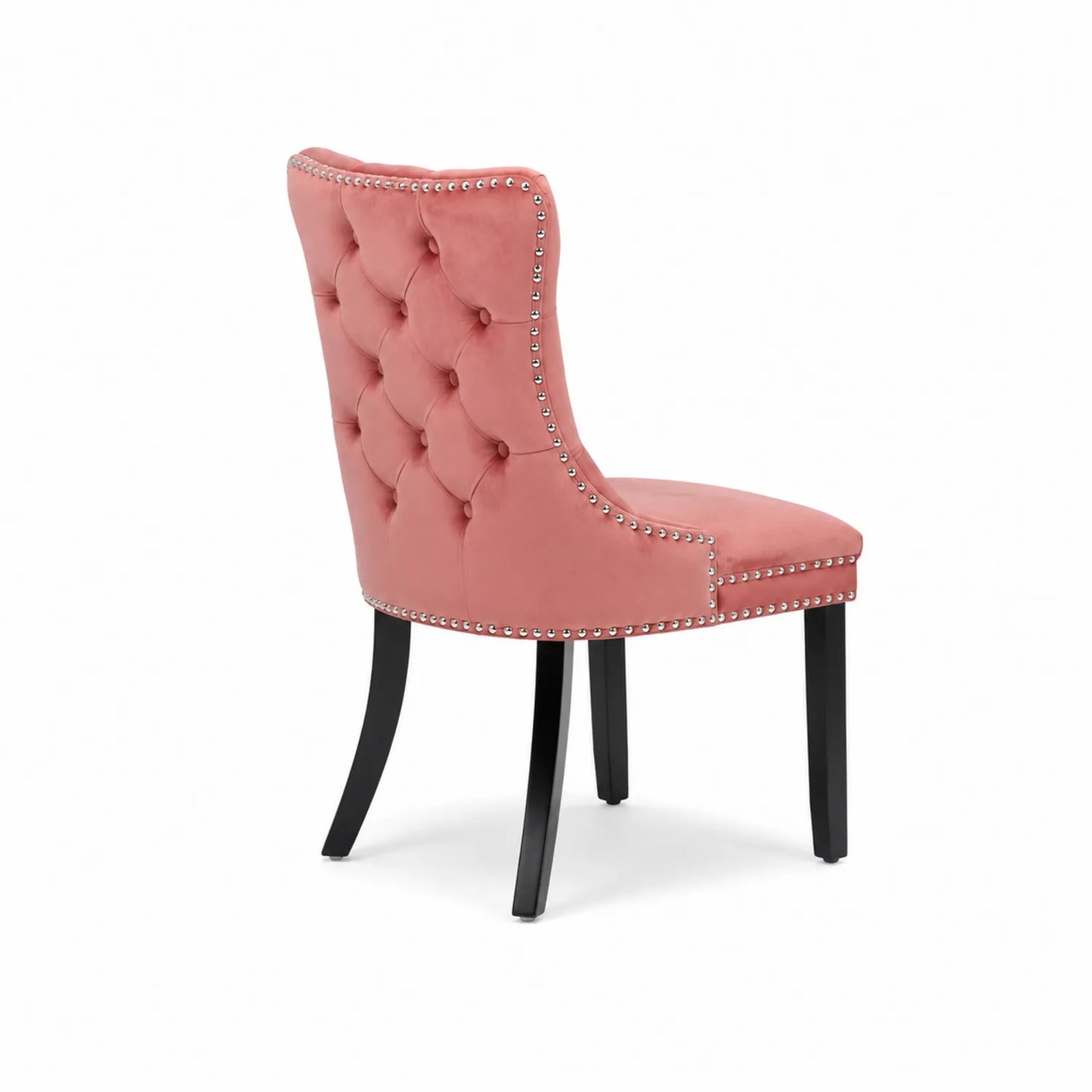 Silla de comedor tapizada en terciopelo rosa con estructura de madera