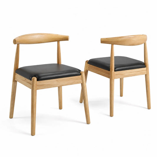 Juego de sillas de madera con asiento de cuero negro